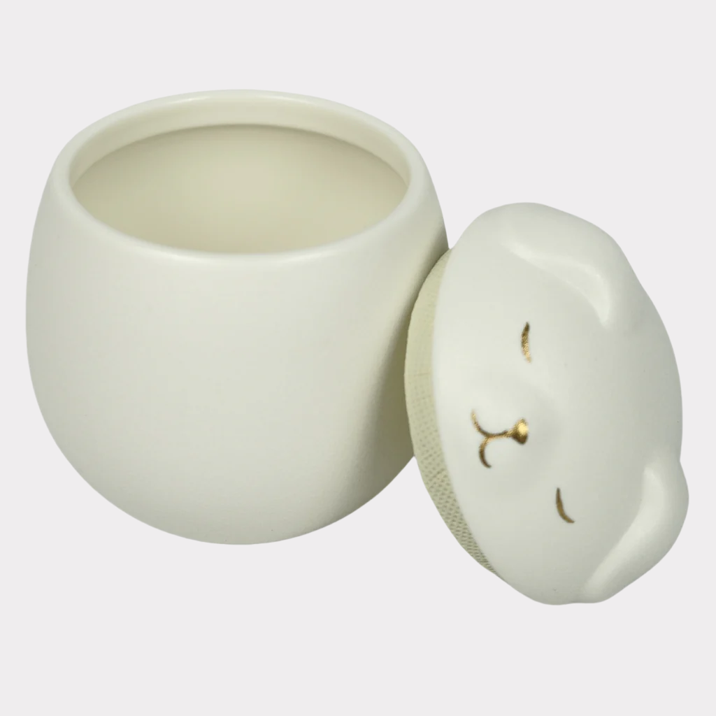 White puppy ceramic urn