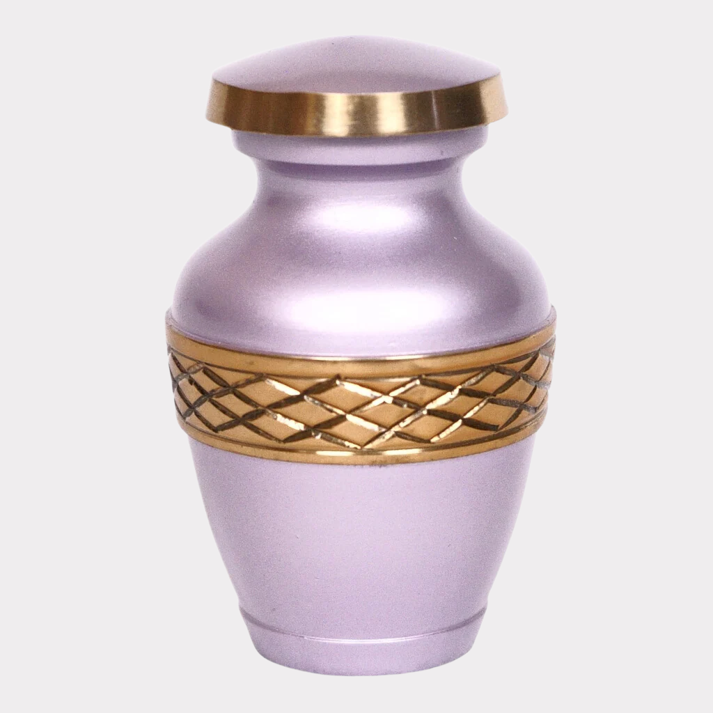 Pink keepsake urn with gold leaf details