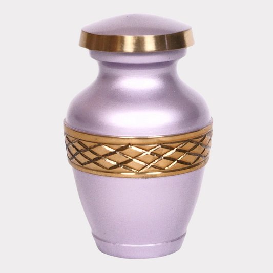 Pink keepsake urn with gold leaf details