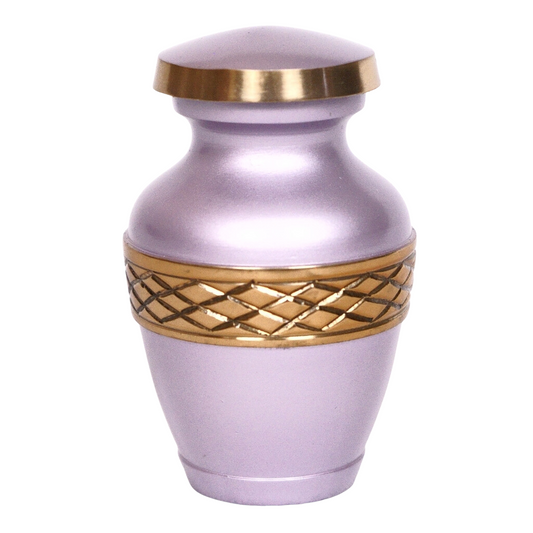 Pink keepsake urn with gold leaf details